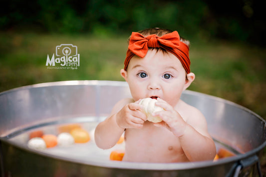 Picture taken by a New Jersey Child Photographer of a milk bath